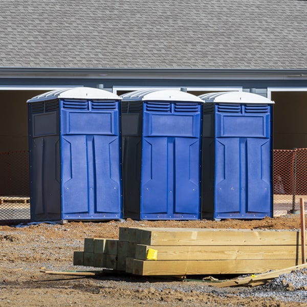 what is the cost difference between standard and deluxe portable toilet rentals in Moreau NY